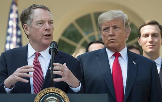 This file photo from October 1, 2018 shows US trade representative Robert Lighthizer (L), who is leading trade talks with China, standing next to President Donald Trump and Trump's son-in-law and adviser Jared Kushner