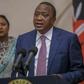 President Uhuru Kenyatta giving a speech with CS Amina Mohammed