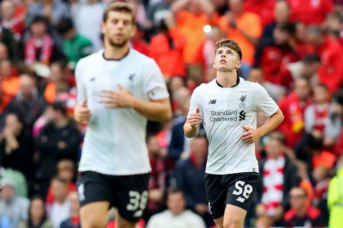 Liverpool's striker Ben Woodburn (R) celebrates after scoring on August 5, 2017