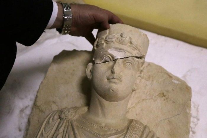 The European Union says it is cracking down on lucrative trade in artefacts looted in war zones such as this rare funeral bust from Palmyra, Syria, estimating illicit trade from "crimes against our common cultural heritage" at around $6.5 billion