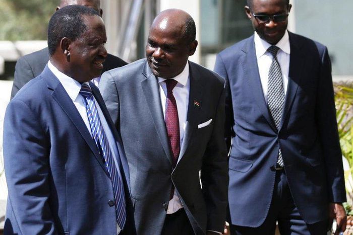 NASA luminary Raila Odinga with IEBC Chairman Wafula Chebukati (C) and CEO Ezra Chiloba during their meeting at the Capital Hill on February 8, 2017.