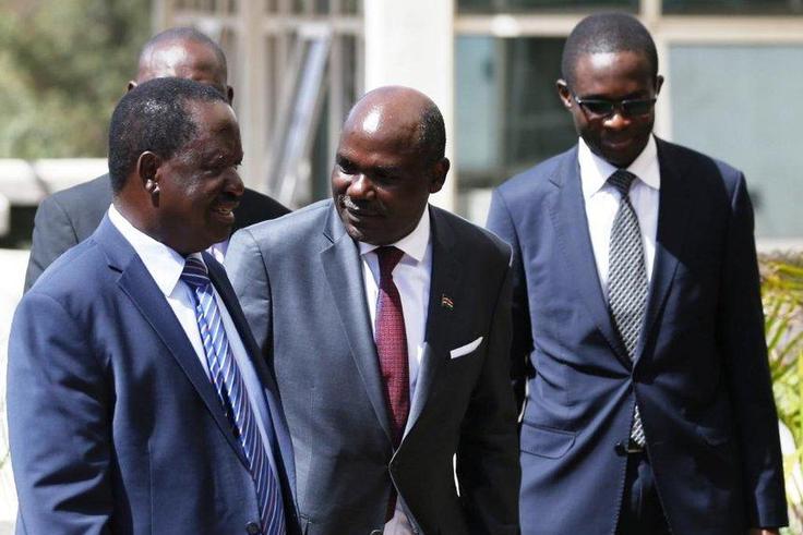 NASA luminary Raila Odinga with IEBC Chairman Wafula Chebukati (C) and CEO Ezra Chiloba during their meeting at the Capital Hill on February 8, 2017.