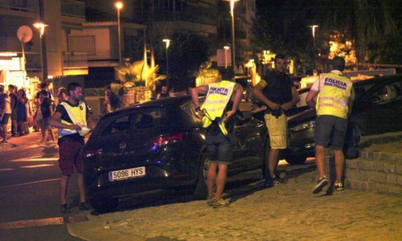 Police inspect the vehicle used in the Cambrils attack