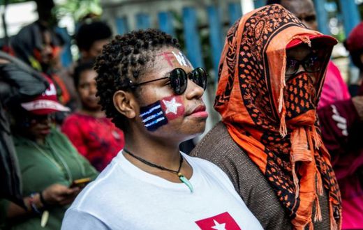 Hundreds gathered in Surabaya in Indonesia to commemorate Papua's liberation from Dutch colonial rule