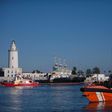 Would-be immigrants stand on a coastguard vessel as they arrive in Spain March 2, 2017, after an inflatable boat carrying 52 people was rescued by the Spanish coastguard, some of the more than 8,000 migrants who had arrived in Spain in 2017 by August
