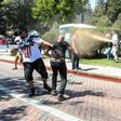 Joey Gibson (black t-shirt), leader of the alt-right Patriot Prayer group, gets pepper sprayed by leftist counter demonstrators in Berkeley, California