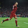 Liverpool's midfielder Emre Can celebrates scoring the team's first goal during the Champions League qualifier, second leg match against Hoffenheim August 23, 2017