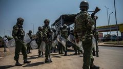 Kenyan police arrive to break up a protest from opposition supporters in Kisumu, western Kenya, on August 9, 2017