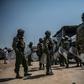 Kenyan police arrive to break up a protest from opposition supporters in Kisumu, western Kenya, on August 9, 2017