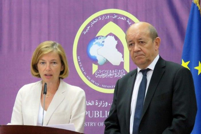 French Foreign Affairs Minister Jean-Yves Le Drian (R) and French Defence Minister Florence Parly (L) attend a press conference following a meeting with Iraqi Foreign Minister in Baghdad
