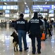 Italian police officers patrol at Rome's Fiumicino aiport