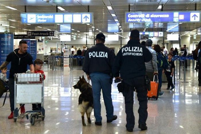 Italian police officers patrol at Rome's Fiumicino aiport