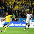 France's goalkeeper Hugo Lloris (L) reacts as Sweden's forward Ola Toivonen shoots to score during the FIFA World Cup 2018 qualification football match