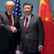 US President Donald Trump and Chinese President Xi Jinping (R) shake hands prior to a meeting on the sidelines of the G20 Summit in Hamburg, Germany on July 8, 2017