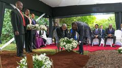 President Uhuru Kenyatta and First Lady Margaret Kenyatta lay a wreath at BM Gecaga's grave in 2016. Behind them (seated) is Jomo and his father Udi
