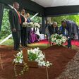 President Uhuru Kenyatta and First Lady Margaret Kenyatta lay a wreath at BM Gecaga's grave in 2016. Behind them (seated) is Jomo and his father Udi