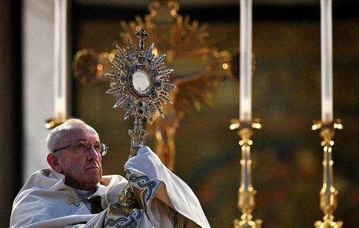 Pope Francis celebrates mass after a procession through Rome, on June 18, 2017