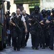 Armed police officers patrol on the streets of London on June 4, 2017 following a terror attack the previous evening
