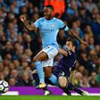 Manchester City's Raheem Sterling (L) fights for the ball with Everton's Leighton Baines during their English Premier League match, at the Etihad Stadium in Manchester, on August 21, 2017