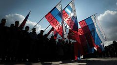 People wave Russian national flag as they celebrate the third anniversary of the annexation of the Crimea by the Russian Federation in Sevastopol in March 2017