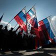 People wave Russian national flag as they celebrate the third anniversary of the annexation of the Crimea by the Russian Federation in Sevastopol in March 2017