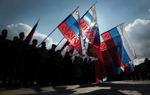 People wave Russian national flag as they celebrate the third anniversary of the annexation of the Crimea by the Russian Federation in Sevastopol in March 2017