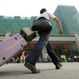 Unusual cargo: a Chinese man was detained after a scanner showed he had his brother's severed arms in his luggage