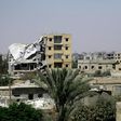 Damaged buildings in Raqa's western al-Darya neighbourhood, pictured on August 14, 2017 as Syrian Democratic Forces (SDF), a US backed Kurdish-Arab alliance, battle to retake the city from the Islamic State (IS) group