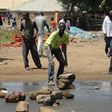 National Super Alliance (NASA) opposition coalition supporters demonstrate in the streets of the Kondele Estate in Kisumu, along Lake Victoria, demanding their candidate to be named the winner in the general elections on August 11, 2017