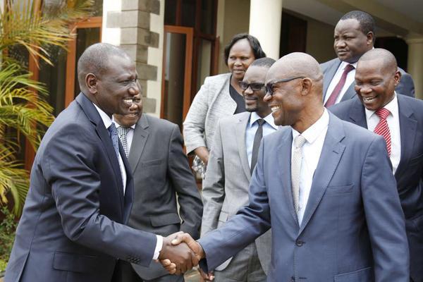 File image of DP William Ruto with MPs from Western on March 29, 2018