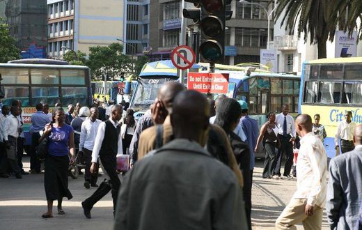Kenyans on a busy Nairobi street. Mobile loan app services have come up with a new strategy to compel defaulters to pay up their loans