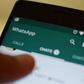 A user views WhatsApp messenger on his phone (twitter)