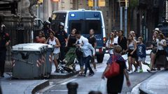 People flee the scene of the attack which occurred in Barcelona, Spain, on August 17, 2017.