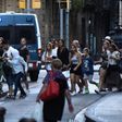 People flee the scene of the attack which occurred in Barcelona, Spain, on August 17, 2017.