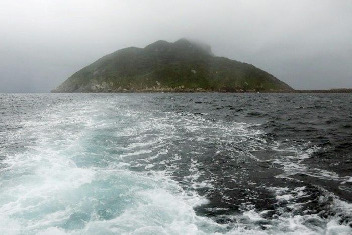 The tiny landmass of Okinoshima, where women are banned and male visitors must bathe naked in the sea before visiting its shrine, was declared a UNESCO World Heritage site last week