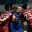 The brawl erupted after Shanghai SIPG playmaker Oscar appeared to fire the ball deliberately at Guangzhou players