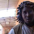 A file grab taken from a video shows Aliou Mahamar Toure, a member of Al-Qaeda offshoot MUJAO, who is on trial for alleged atrocities committed when he was the head of an Islamic police brigade deployed by jihadists in the northern Mali city of Gao.