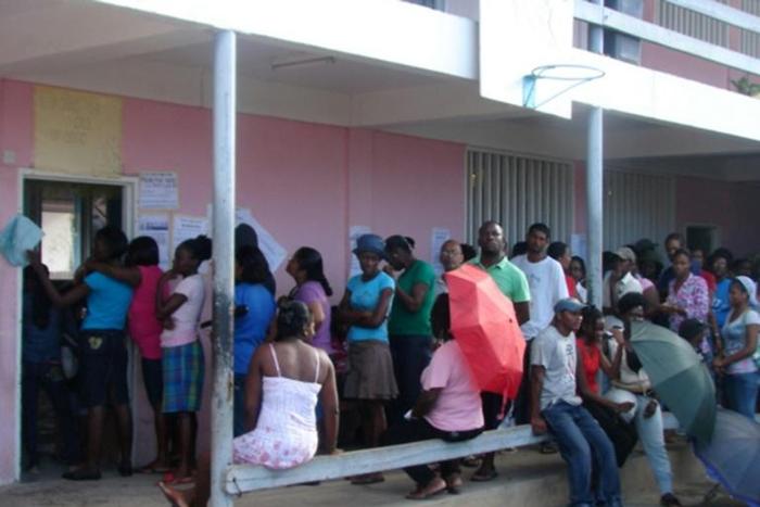 Voters waited in line at a polling station in Georgetown, Guyana, during general elections on November 28, 2011, and will cast ballots again after the government lost a no-confidence motion in late 2018