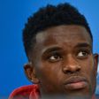 Benfica's defender Nelson Semedo looks on during a press conference at Luz stadium in Lisbon, on December 5, 2016, on the eve of the UEFA Champions League Group B football match SL Benfica vs Napoli