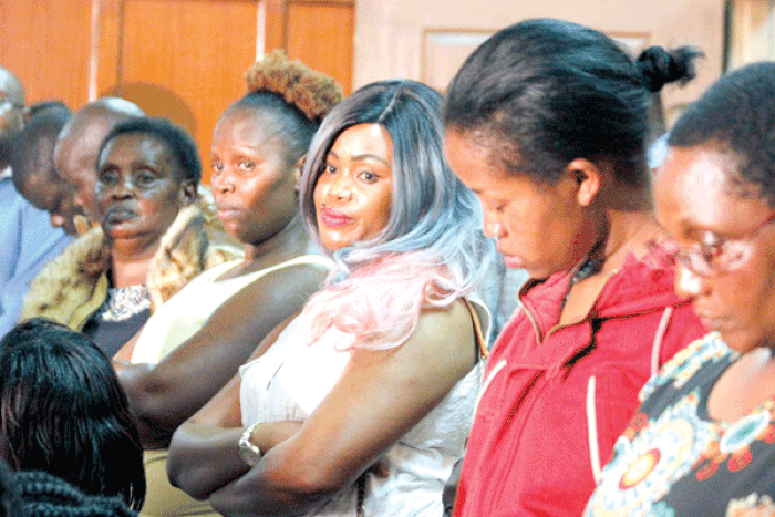 File image of suspects in the infamous NYS scandal in court