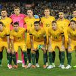 Australia's players pose for a team photo before their friendly match against Brazil, in Melbourne, on June 13, 2017