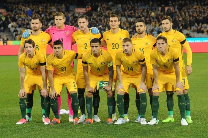 Australia's players pose for a team photo before their friendly match against Brazil, in Melbourne, on June 13, 2017