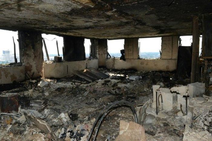 The inside of the Grenfell Tower in west London on June 16, 2017 after a fire engulfed the 24-storey building