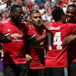 Manchester United forward Anthony Martial (R) celebrates with midfielder Jesse Lingard after Lingard scored a goal on July 23, 2017 in Santa Clara, California