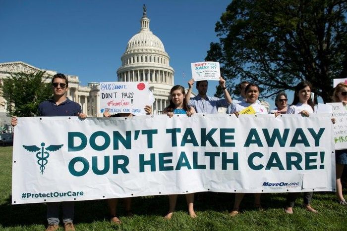 US protesters demonstrate against the Republicans' healthcare bill as they stage a rally outside the US Capitol in Washington, DC
