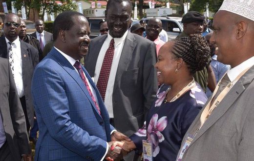 Raila shakes hands with Governor Waiguru during 2018 Devolution Conference