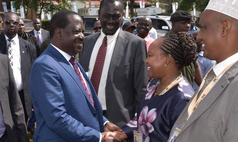 Raila shakes hands with Governor Waiguru during 2018 Devolution Conference