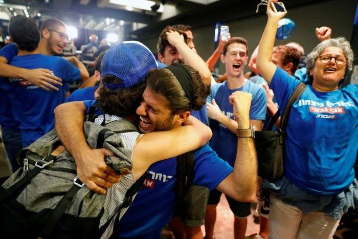 Supporters of Israeli politician Avi Gabbay celebrate after he was elected leader of Israel's main opposition Labour Party in the coastal city of Tel Aviv on July 10, 2017