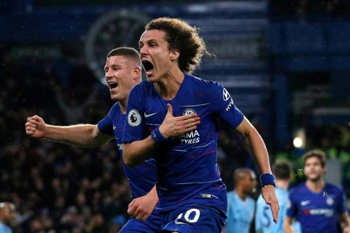 Chelsea defender David Luiz (right) celebrates his goal against Manchester City