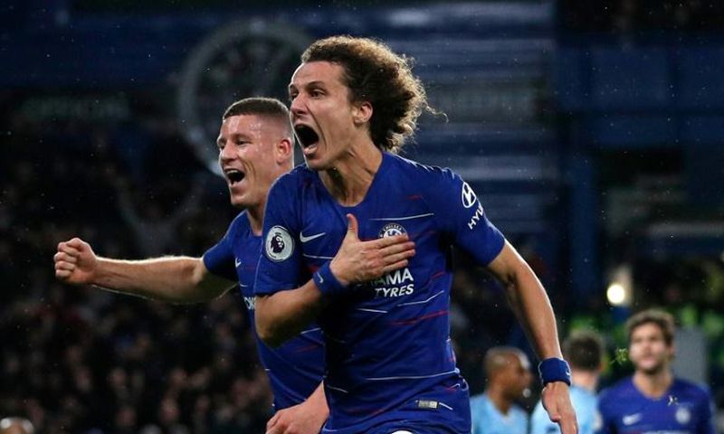 Chelsea defender David Luiz (right) celebrates his goal against Manchester City